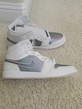 Nike Air Jordan 1 High White with Iridescent Panels.